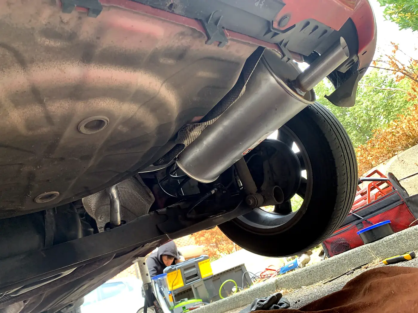 Underside of a car showing the rear exhaust and back box