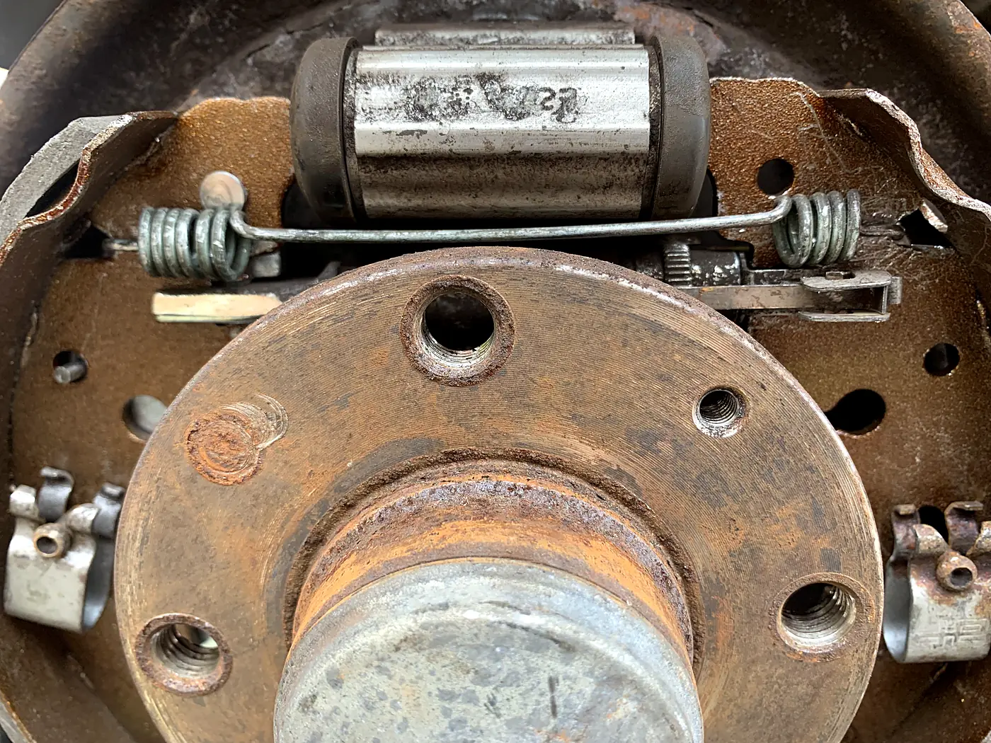 Rear drum brake wheel cylinder and shoes repaired.